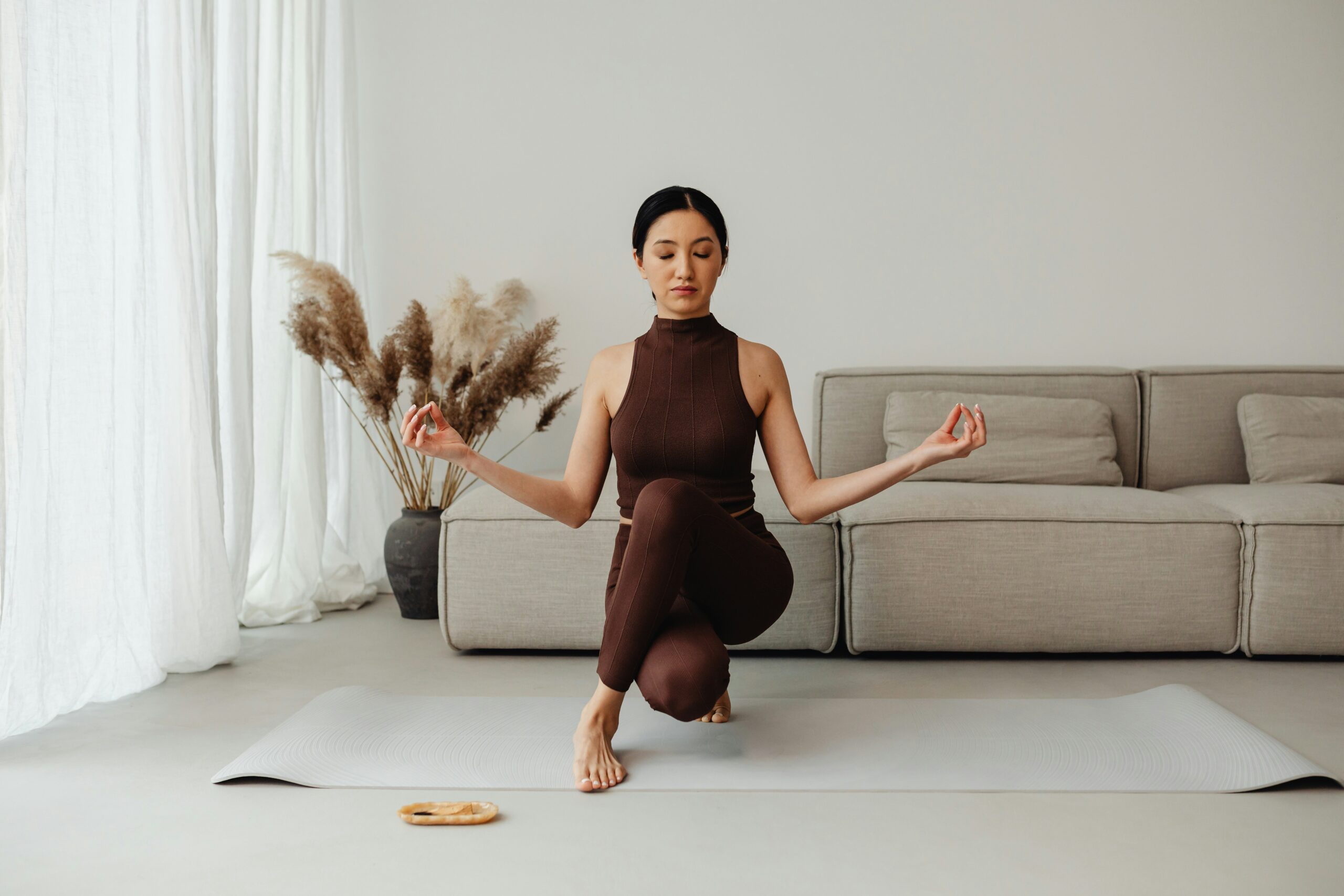 a woman stretching and meditating