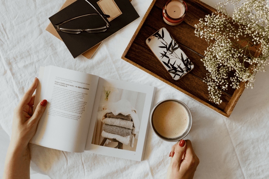 a book and a cup of coffee