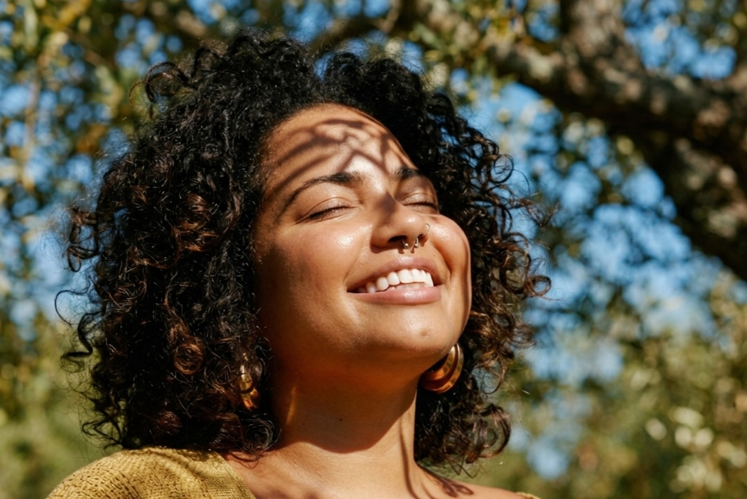 a featured image for a blog post about quotes for smiling through pain