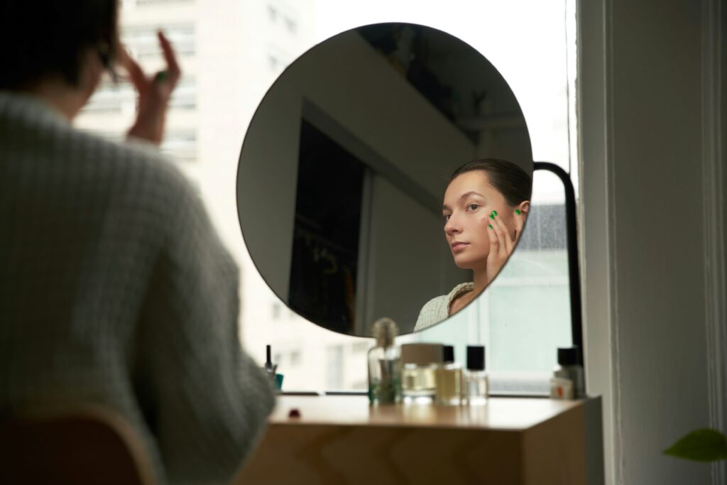 a woman doing skincare