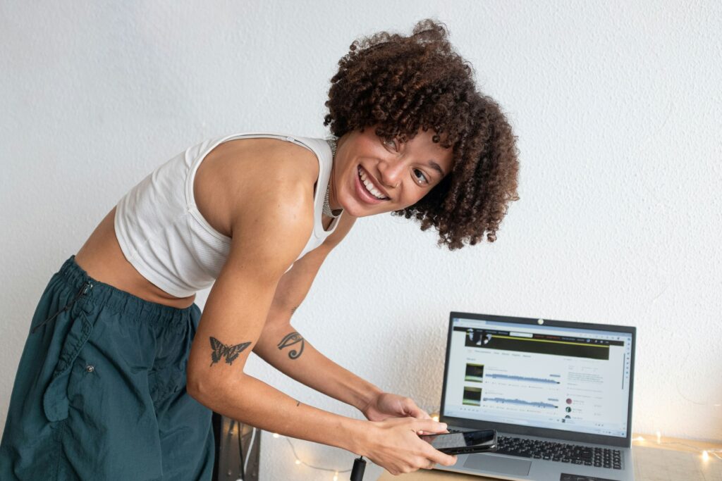 a woman creating a playlist