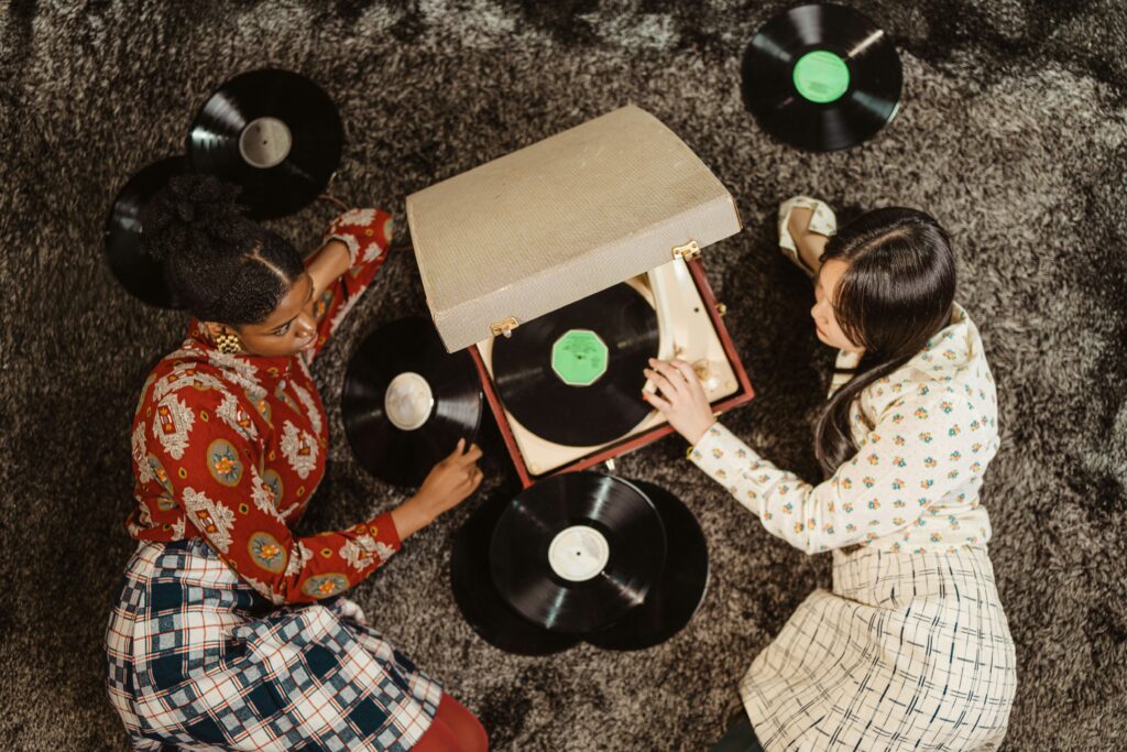 women listening to vinyls
