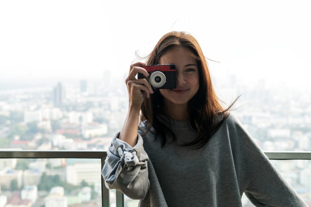 a woman taking photos