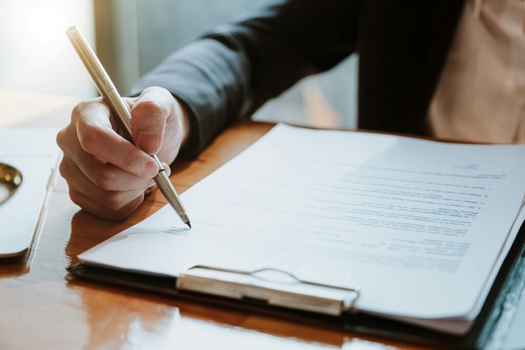 a woman reading a contract